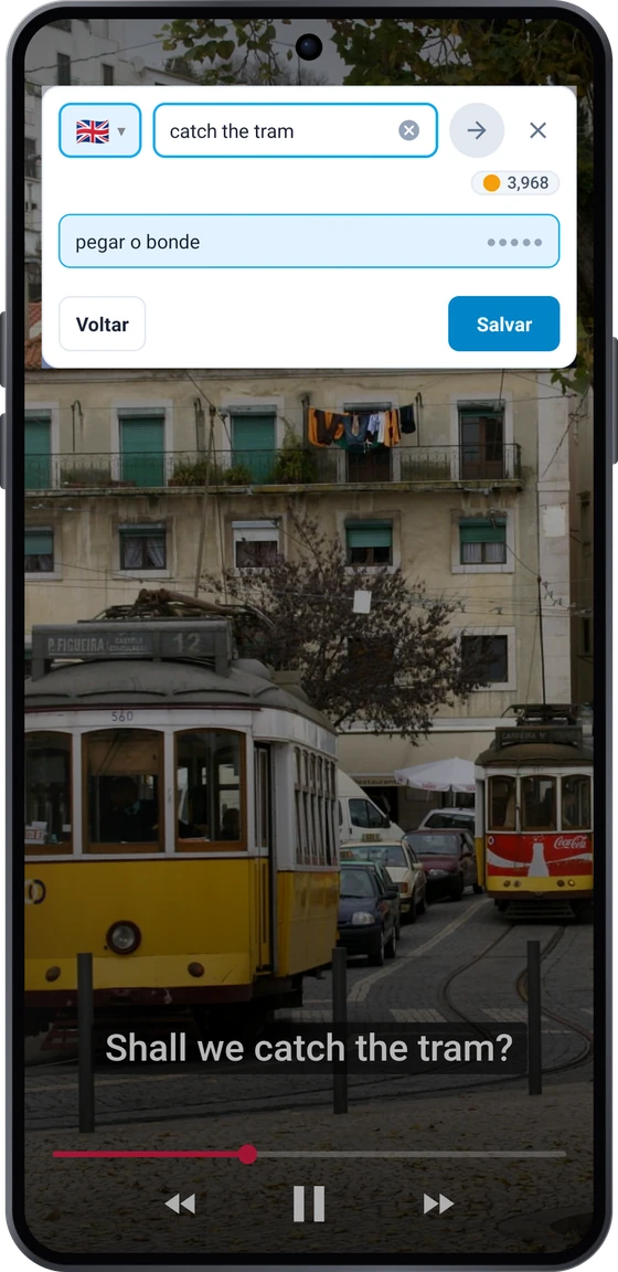 O botão flutuante sobre um vídeo no Android: a frase da legenda apanhar o elétrico com as traduções take the tram e catch the tram