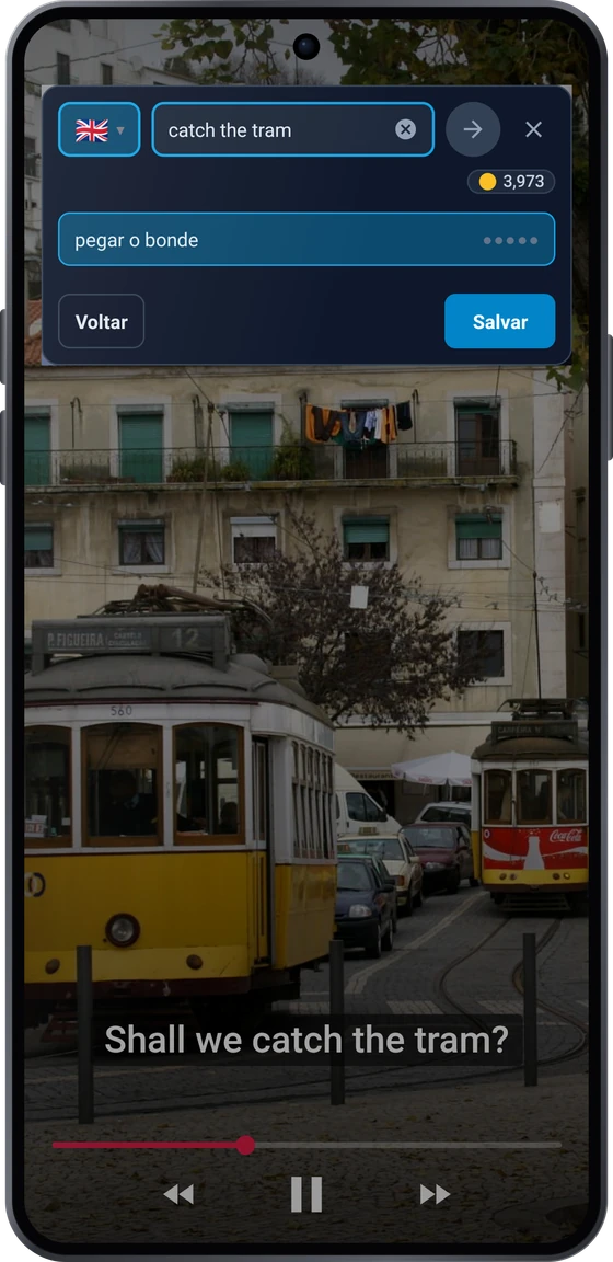 O botão flutuante sobre um vídeo no Android: a frase da legenda apanhar o elétrico com as traduções take the tram e catch the tram