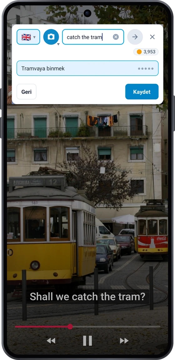 Android’de bir videonun üzerindeki kayan düğme: altyazıdaki apanhar o elétrico ifadesi ve take the tram, catch the tram çevirileri