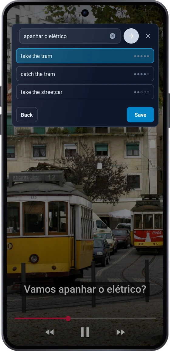 The capture bubble over a video on Android: the subtitle phrase apanhar o elétrico with the translations take the tram and catch the tram