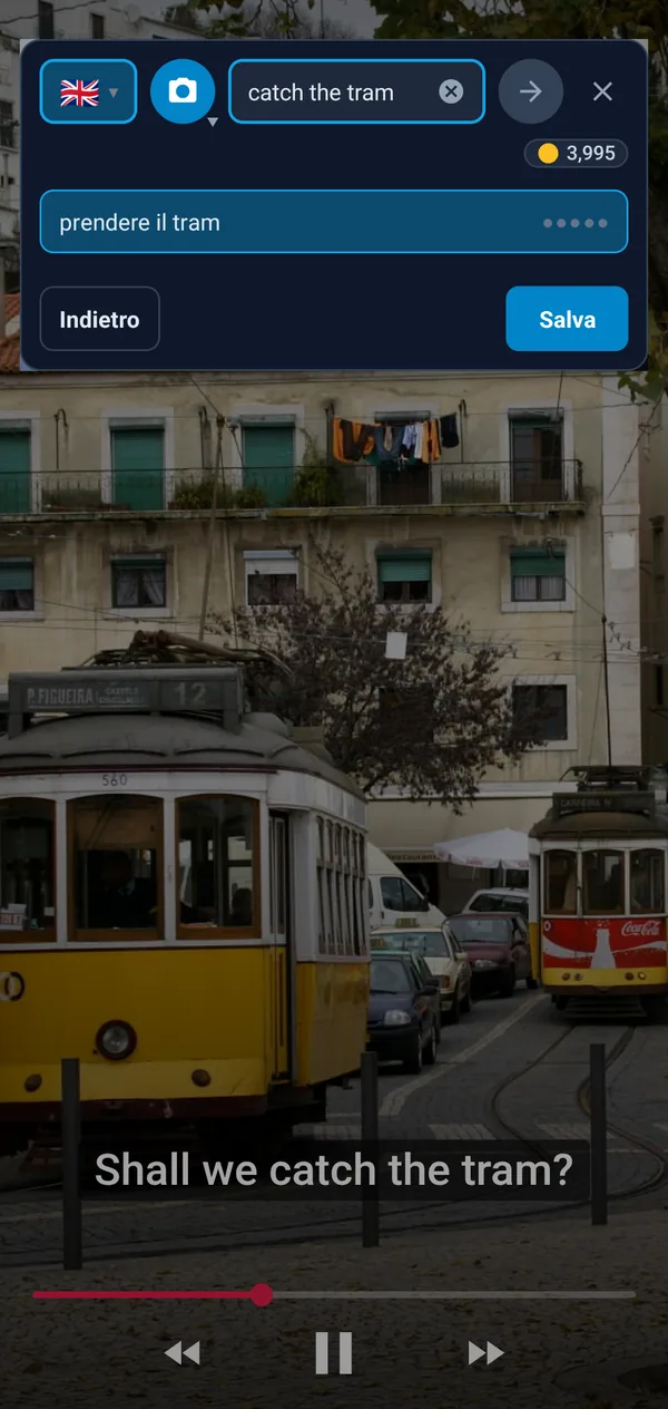 Il pulsante flottante sopra un video: l’espressione dei sottotitoli apanhar o elétrico con le traduzioni prendere il tram e salire sul tram