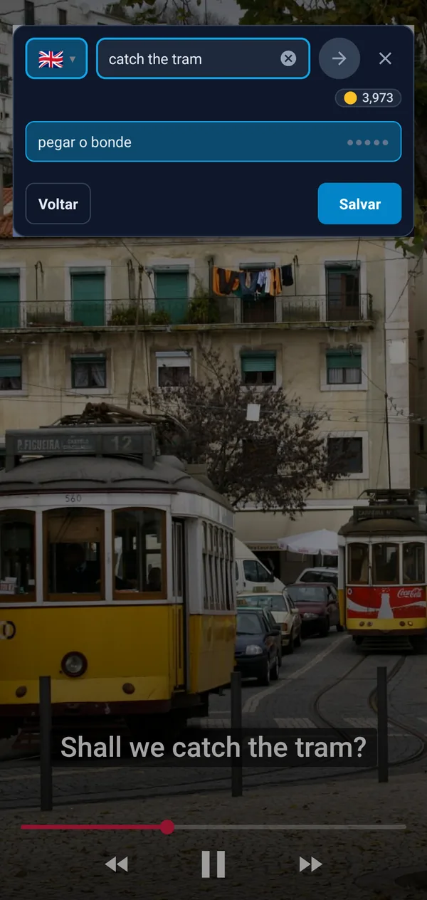 O botão flutuante sobre um vídeo: a expressão da legenda apanhar o elétrico com as traduções take the tram e catch the tram