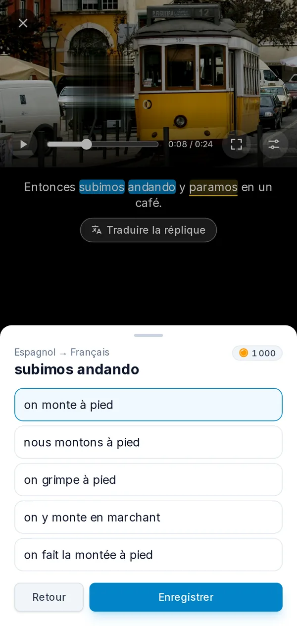 Le lecteur sur un téléphone : une vidéo en pause avec une expression choisie dans les sous-titres et ses traductions