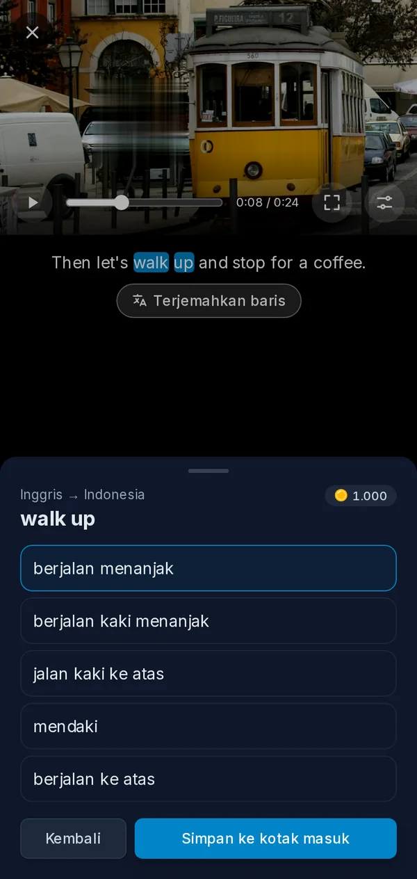 Pemutar di ponsel: video yang dijeda dengan frasa yang dipilih dari subtitel beserta terjemahannya