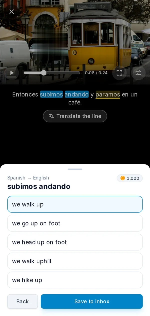 The player on a phone: a paused video with a phrase picked from the subtitles and its translations