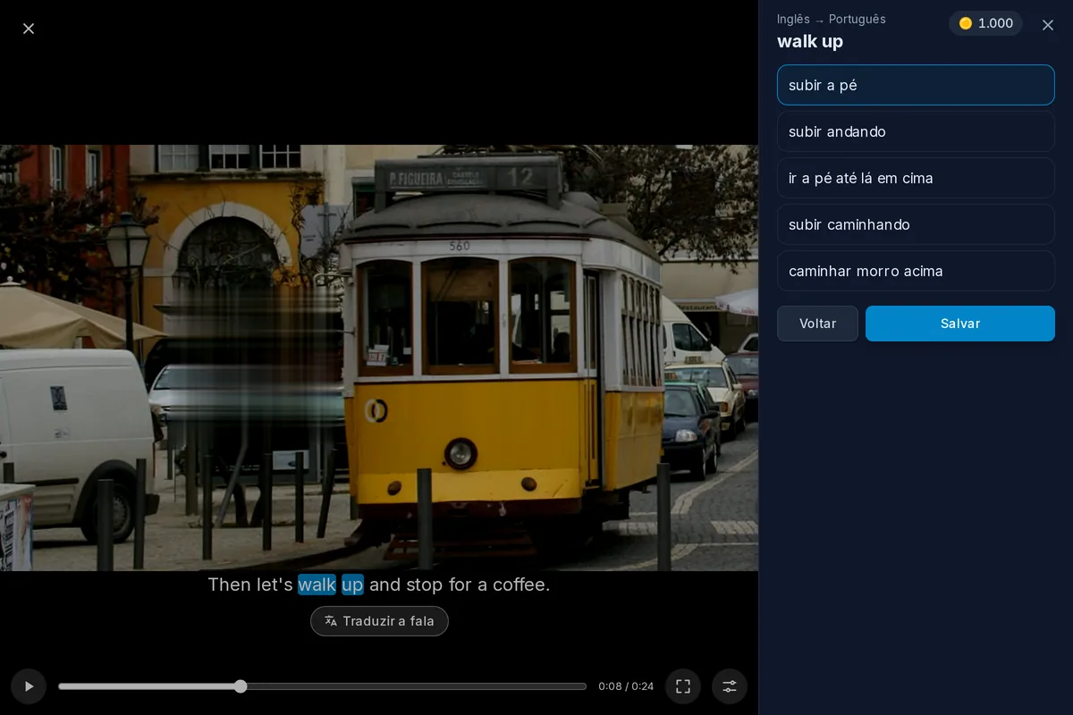 Um vídeo pausado com uma linha de legenda, duas palavras selecionadas como expressão e as traduções abertas abaixo